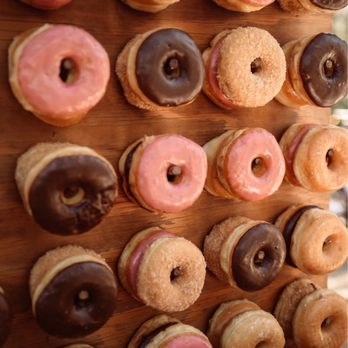 One Sweet Table - @taylordavidsonphotography  Donut Wall! - Desserts Near Me