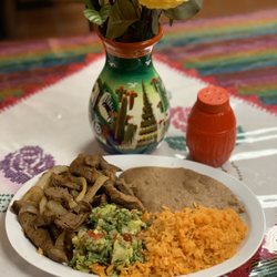 Bistec encebollado (grilled steak)