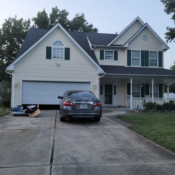 Hometown Remodeling - a car parked in front of a house - General Contractors Near Me - Virginia Beach, Virginia