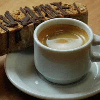 Stella's - a cup of coffee and a piece of bread - Bakeries Near Me - Winnipeg, Manitoba