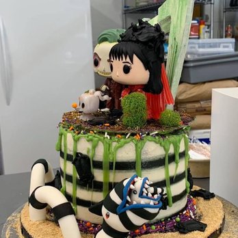 Bella's Cookies - a cake with a character on top - Bakeries Near Me - Milton, Delaware