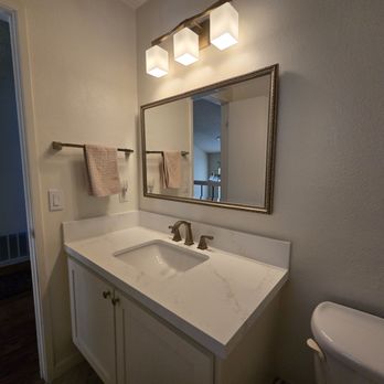 Papo Construction - Now, our light fixture is centered over the faucet! - General Contractors Near Me