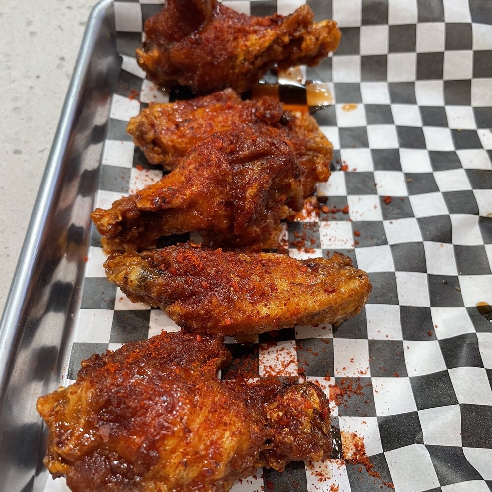 WNB Factory - chicken wings on a checkered tray - Chicken Wings Near Me - Carrollton, Texas WNB Factory - chicken wings on a checkered tray - Chicken Wings Near Me - Carrollton, Texas