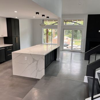 LA Concrete Works - Microtopping (foyer in foreground); Stain and seal rest - Masonry/Concrete Near Me
