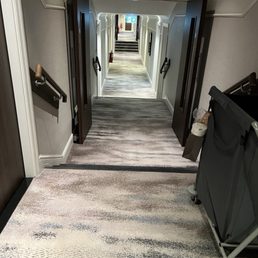 Steps in the middle of the hallway that you're left to navigate without the advertised concierge.