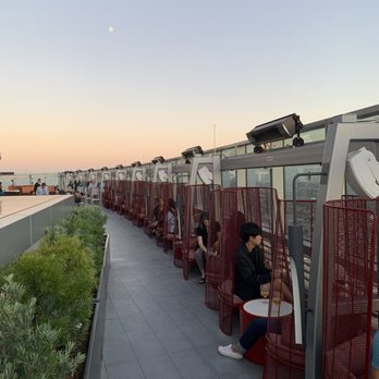Spire 73 - Seating along the side with the amazing view. Cute very personal little seats. - Cocktail Bars Near Me - Los Angeles, California Spire 73 - Seating along the side with the amazing view. Cute very personal little seats. - Cocktail Bars Near Me - Los Angeles, California