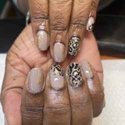 Totally Polished Nail and Skin Spa - Debbie is Dropped in this gold and cheetah print by SNOW!!! Yay