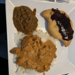 Vijay's Restaurant - Eggplant dish , butter chicken and a meat Somoza with a very good tamarind sauce.