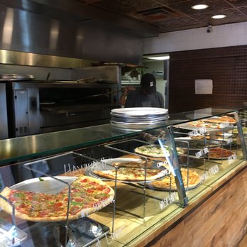 Wiseguy Pizza - Plenty of options of different slices to choose from. - Pizza Near Me - Washington, DC, District of Columbia