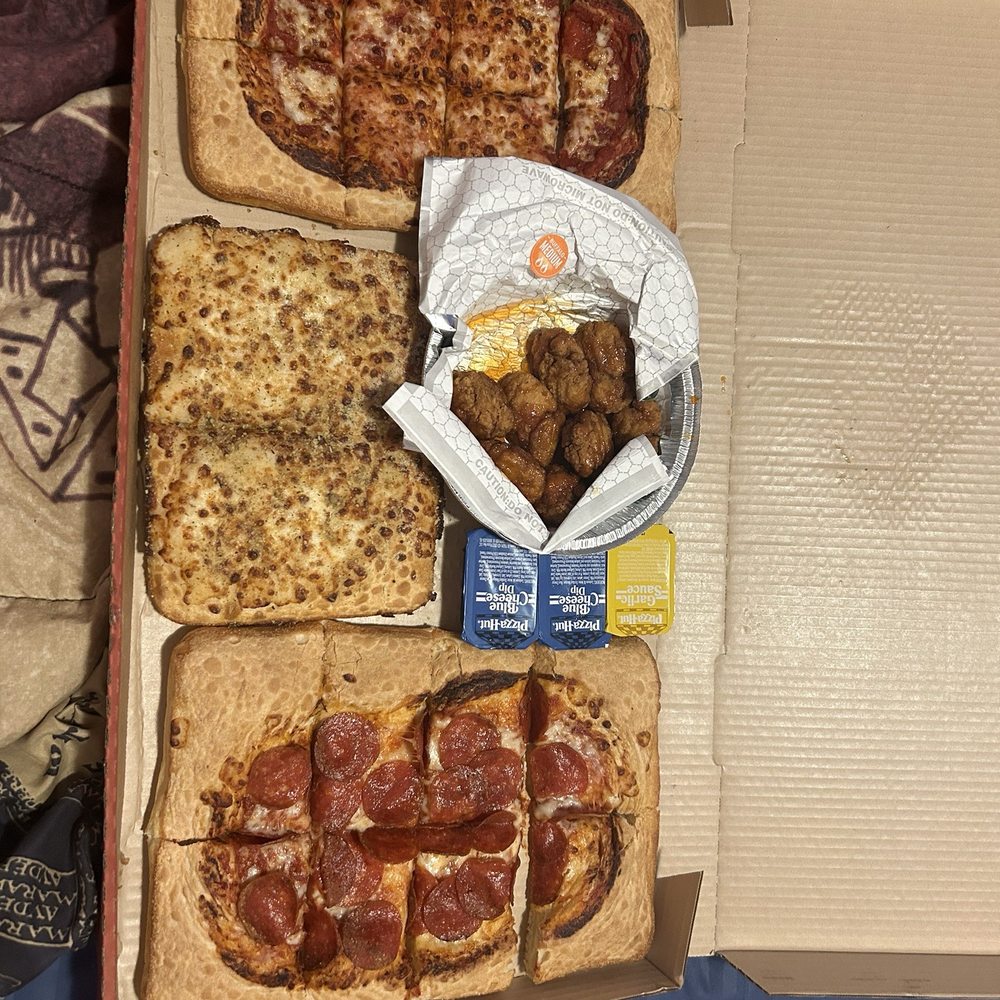 What the hell is this Pizza Hut ? This is so disappointing I spent $45 dollars on this is ridiculous this is not even pizza What the hell is this Pizza Hut ? This is so disappointing I spent $45 dollars on this is ridiculous this is not even pizza