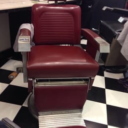 Old fashioned barber chairs and vibrating massages