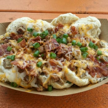 Biscuits and Groovy - The Johnny Hash - Bacon, sausage, potatoes, cheese, green onions, gravy and biscuits - Breakfast & Brunch Near Me - Austin, Texas Biscuits and Groovy - The Johnny Hash - Bacon, sausage, potatoes, cheese, green onions, gravy and biscuits - Breakfast & Brunch Near Me - Austin, Texas