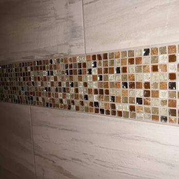 Fort Collins Home Improvement - a tiled shower wall - General Contractors Near Me - Fort Collins, Colorado Fort Collins Home Improvement - a tiled shower wall - General Contractors Near Me - Fort Collins, Colorado
