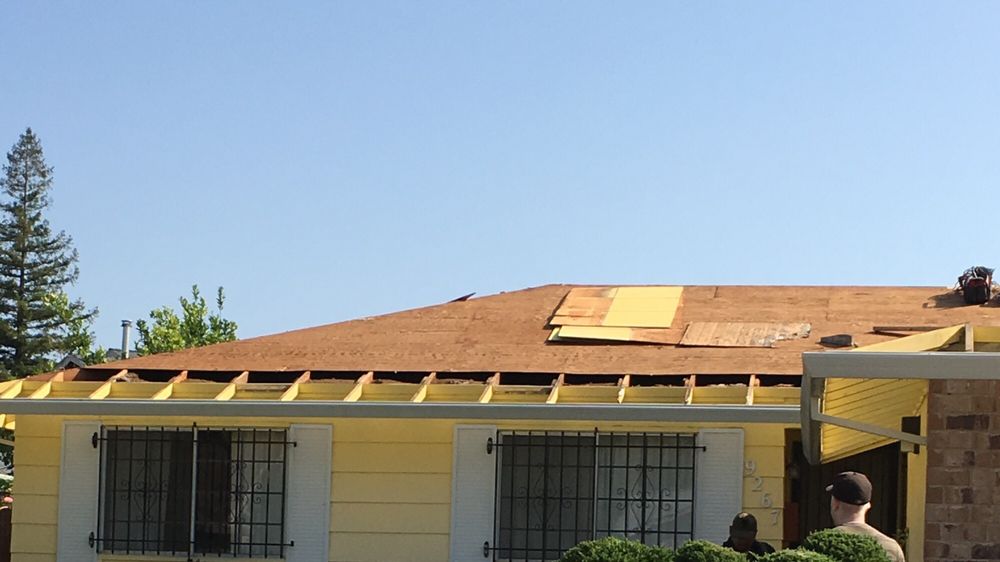 Slide of Signature Roofing