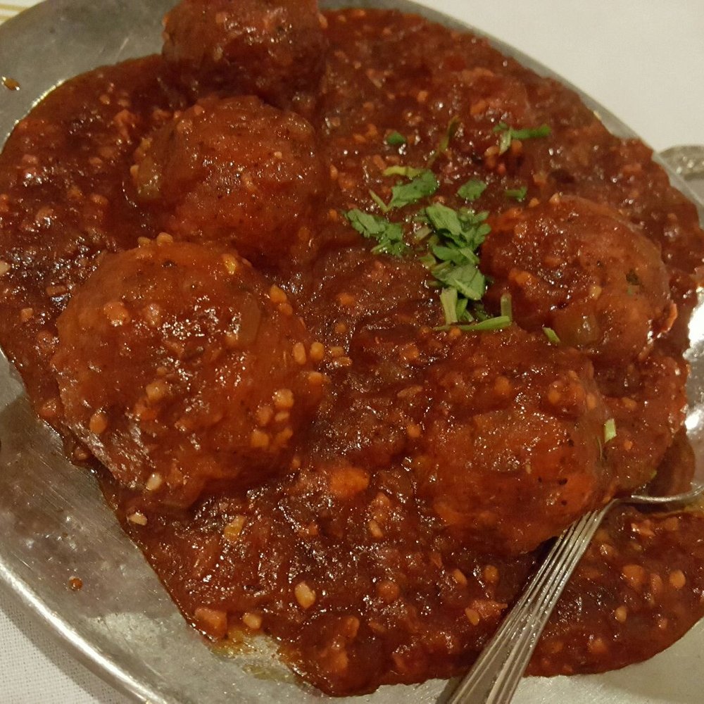 Taj Grill - Veggie manchurian. Spiced red sauce - Indian Near Me - Buffalo, New York Taj Grill - Veggie manchurian. Spiced red sauce - Indian Near Me - Buffalo, New York