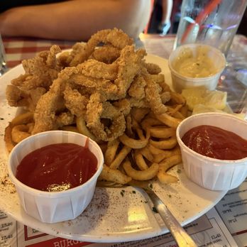 Heroes Restaurant and Brewhouse - Calamari over curly fries - American Near Me - Ontario, California