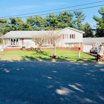 Adriano's Lawn Care - the front of the house - Landscaping Near Me