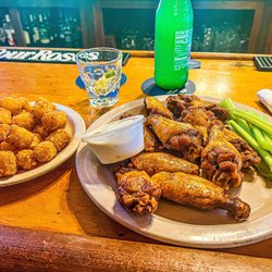 Manuel's Tavern - 10 wings with terry sauce, a Paloma, side of tots