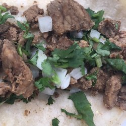 Rico's Tacos - Dry chunks taste smells like dog food