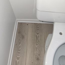 Obvious dirt behind the toilet, they didn't remove toilet seat, I did to replace. Obvious dirt behind the toilet, they didn't remove toilet seat, I did to replace.