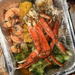 a container of seafood a container of seafood
