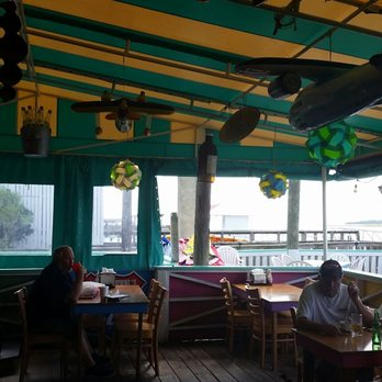 A-J's Dockside Restaurant - Covered porch, catch the breeze, avoid hot sun. - Seafood Near Me - Tybee Island, Georgia A-J's Dockside Restaurant - Covered porch, catch the breeze, avoid hot sun. - Seafood Near Me - Tybee Island, Georgia