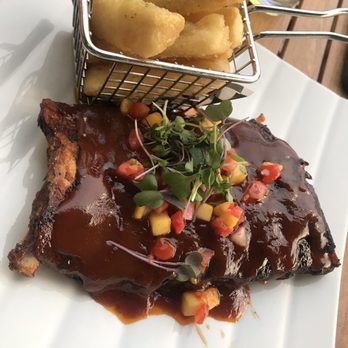 Harry's Poolside Bar & Grill - Mango Ribs with Yucca Fries - American Near Me - Orlando, Florida Harry's Poolside Bar & Grill - Mango Ribs with Yucca Fries - American Near Me - Orlando, Florida