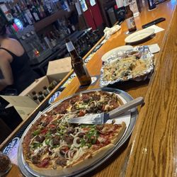 Arch 2 - House Special Pizza and Nachos with Cheese, Olives and Jalapenos