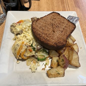 Portage Bay Cafe - 65th - Aji Spicy Scramble; complete with toast and potatoes - Breakfast & Brunch Near Me - Seattle, Washington Portage Bay Cafe - 65th - Aji Spicy Scramble; complete with toast and potatoes - Breakfast & Brunch Near Me - Seattle, Washington