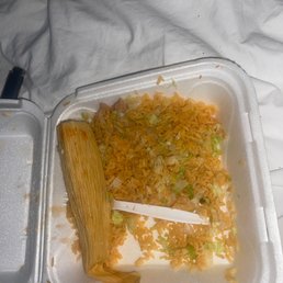 it's a3 tamale plate filled with rice, ensaladas, and tomatoes. Comes with refried beans too it's a3 tamale plate filled with rice, ensaladas, and tomatoes. Comes with refried beans too
