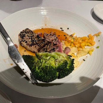 The Beach House - Not edible. Seared tuna was tough and tasteless. This is as far as the wife could get eating it. - Asian Fusion Near Me - Koloa, Hawaii