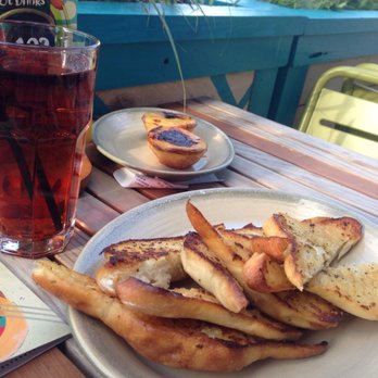 Nando's Peri-Peri - Garlic bread and Portuguese tarts - Portuguese Near Me - Edmonton, Alberta