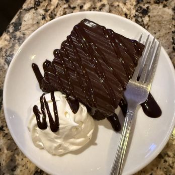 Black Angus Steakhouse - Chocolate cake with whipped cream - Steakhouses Near Me - Kissimmee, Florida Black Angus Steakhouse - Chocolate cake with whipped cream - Steakhouses Near Me - Kissimmee, Florida