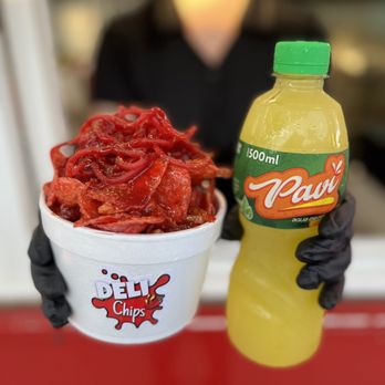 Deli Chips - a person holding a bottle of deli chips - Mexican Near Me - Compton, California Deli Chips - a person holding a bottle of deli chips - Mexican Near Me - Compton, California