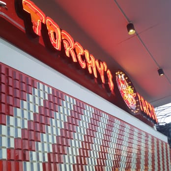 Torchy's Tacos - The logo you see whilst entering Torchy's - Tex-Mex Near Me - Houston, Texas