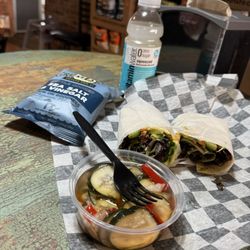 Mill District Deli - Cucumber onion salad and a hummus wrap