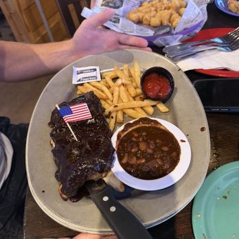 Tailfins Waterfront Grill - 1/2 rack of ribs - Seafood Near Me - Destin, Florida Tailfins Waterfront Grill - 1/2 rack of ribs - Seafood Near Me - Destin, Florida