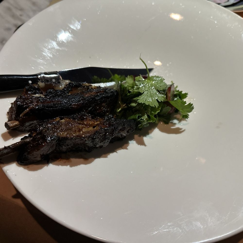 Shmoné - So called Grilled lamb ribs which contained of burned lamb fat and bones - Mediterranean Near Me - New York, New York