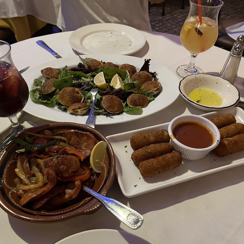 Lola's - Chorizos salteados con pimpientos y cebolla , Croquetas del dia (ham), and stuffed clams - Spanish Near Me - Hoboken, New Jersey Lola's - Chorizos salteados con pimpientos y cebolla , Croquetas del dia (ham), and stuffed clams - Spanish Near Me - Hoboken, New Jersey
