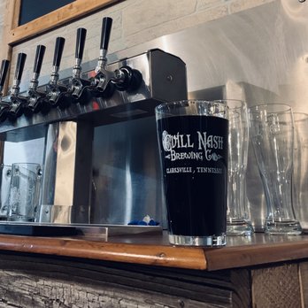 Evill Nash Brewing - Bourbon barrel aged stout in their cool souvenir pint glass... amazingly delicious! - Brewpubs Near Me - Clarksville, Tennessee