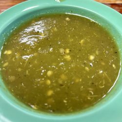 Omg people the green salsa is awesome! It's served warm and has a slight spicy kick! Love it!!