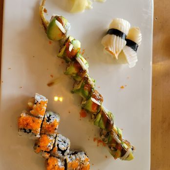 Koi Sushi - a variety of sushi on a white plate - Sushi Bars Near Me - Oviedo, Florida