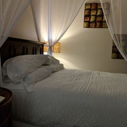 Canopies on every guest bed = instant class.