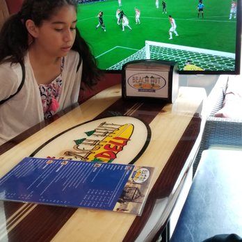 Beach Hut Deli - Surf board tables - Delis Near Me - Oceanside, California