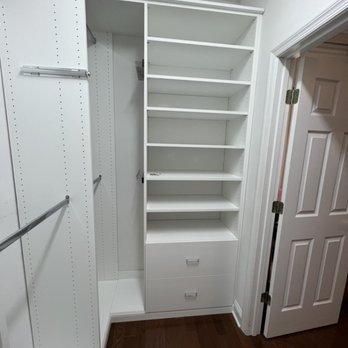 Closets by Design - Philadelphia - Two sections of hanging rods and two 30" wide drawers and shelves. - Interior Design Near Me