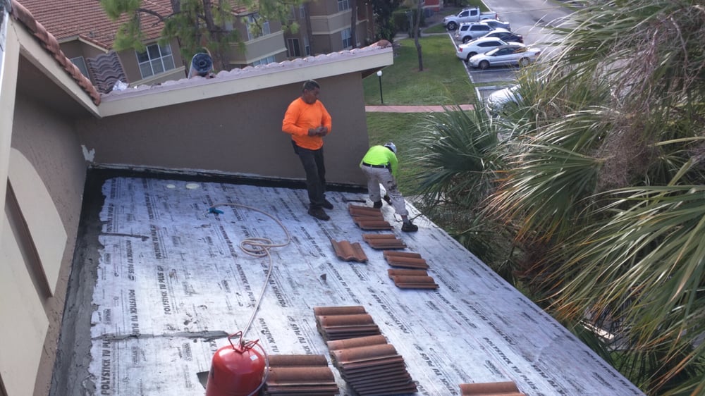 Slide of Riggs Roofing