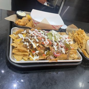 BAJA RICK'S Cantina - The nachos, under appetizer. - Tacos Near Me - San Diego, California BAJA RICK'S Cantina - The nachos, under appetizer. - Tacos Near Me - San Diego, California
