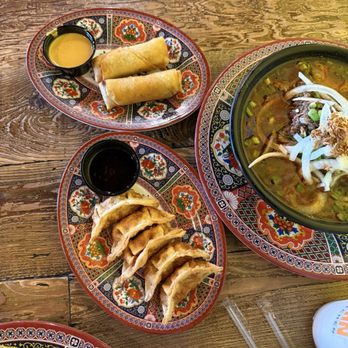 Cris and John - In circular from top to the right. Rajas con queso eggrolls, birria ramen, dumplings - Vietnamese Near Me - Dallas, Texas