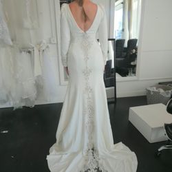 Gabriela Couture - We transformed this dress from a size 16 down to a size 10, achieving a perfect fit on the body! It turned out absolutely beautiful.