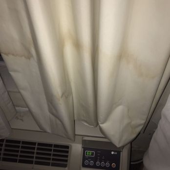 Comfort Suites University - Stained curtains above the poorly working AC - Hotels Near Me - Abilene, Texas Comfort Suites University - Stained curtains above the poorly working AC - Hotels Near Me - Abilene, Texas